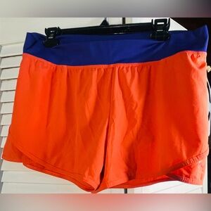 PUMA Orange Shorts with Yellow Accents zipper pocket